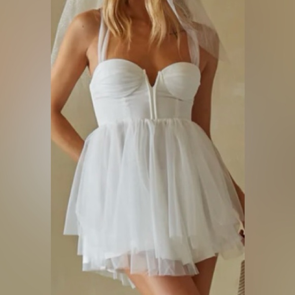 White mini dress with lace up back